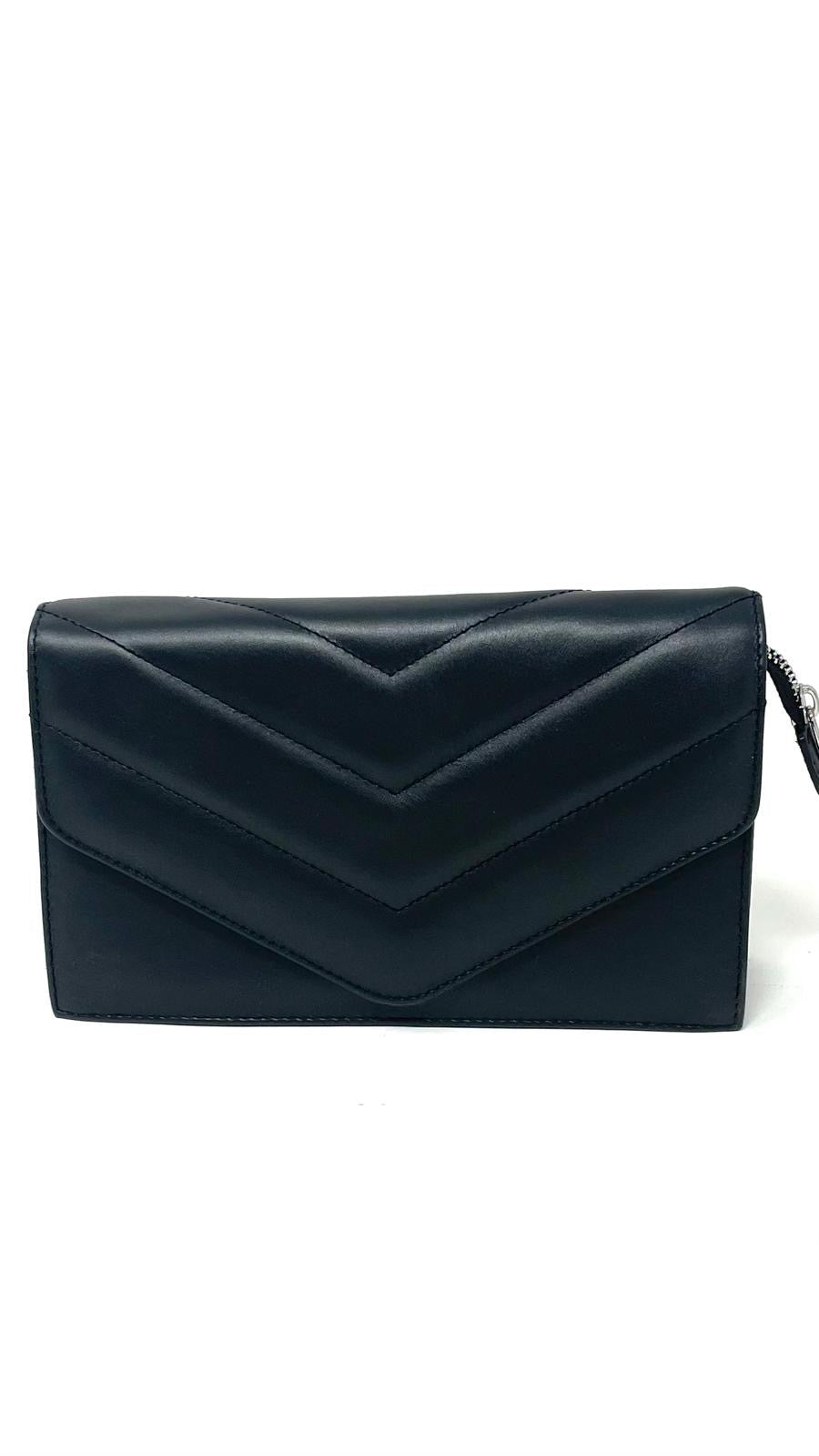 Sandrine black quilted leather handbag with envelope flap — Annick Levesque