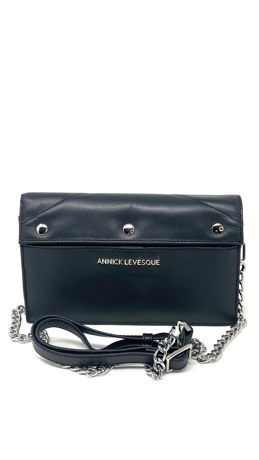 Sandrine black leather wallet handbag laid flat with chain strap — Annick Levesque