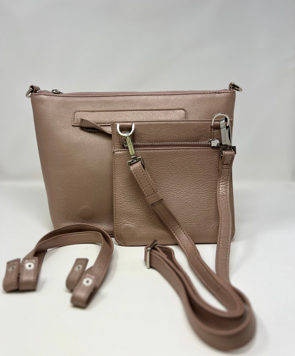 Top view of Lina platinum rose leather handbag with dual handles — Annick Levesque
