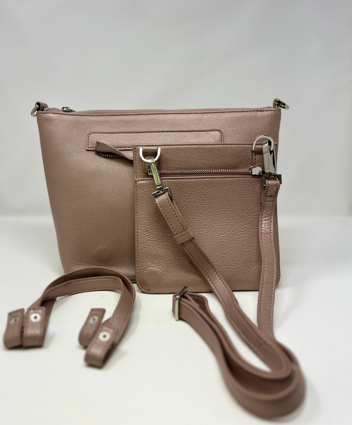 Top view of Lina platinum rose leather handbag with dual handles — Annick Levesque