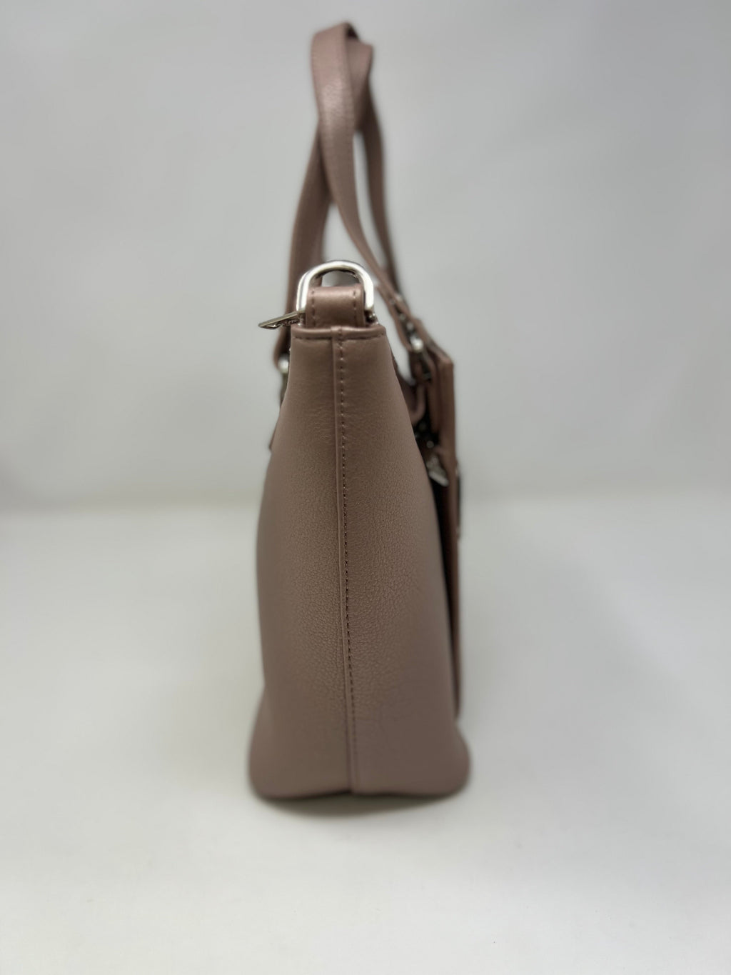 Side profile of Lina platinum rose genuine leather structured handbag — Annick Levesque
