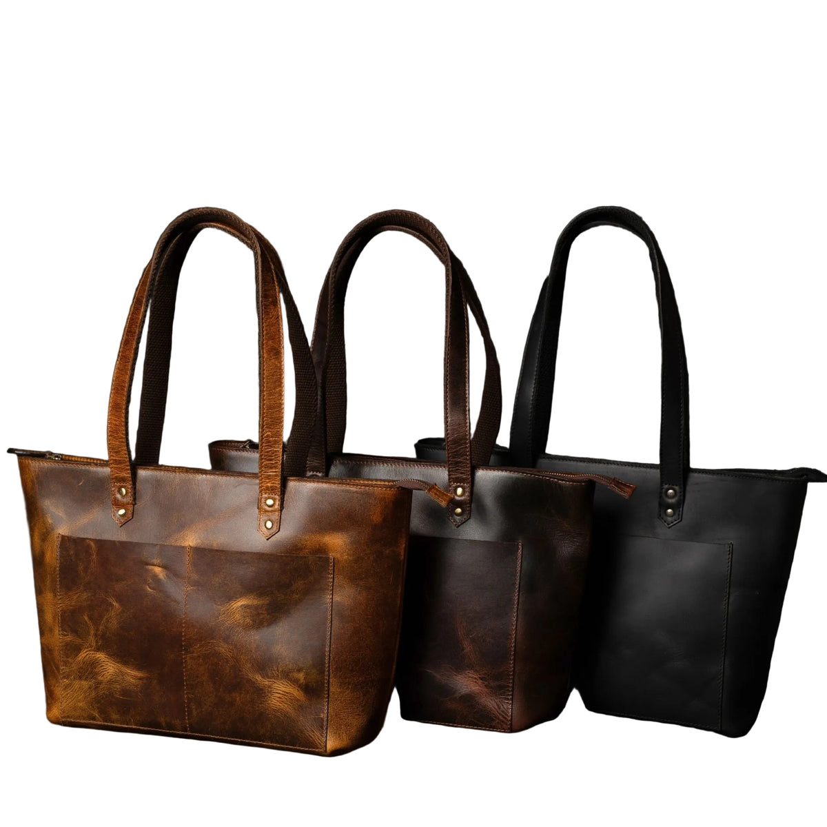 "Classic Leather Tote Bag shown in brown, cognac, and black — distressed full-grain leather handbag available in three colours by NAB Leather"