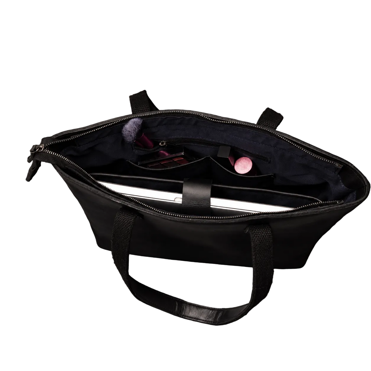 "Interior view of the Classic Black Leather Tote Bag showing nylon lining, zip compartment, and interior pockets — by NAB Leather"
