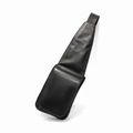 "Bobbie unisex black full-grain leather crossbody sling bag by Annick Levesque, shown flat with single adjustable strap and silver hardware accent"