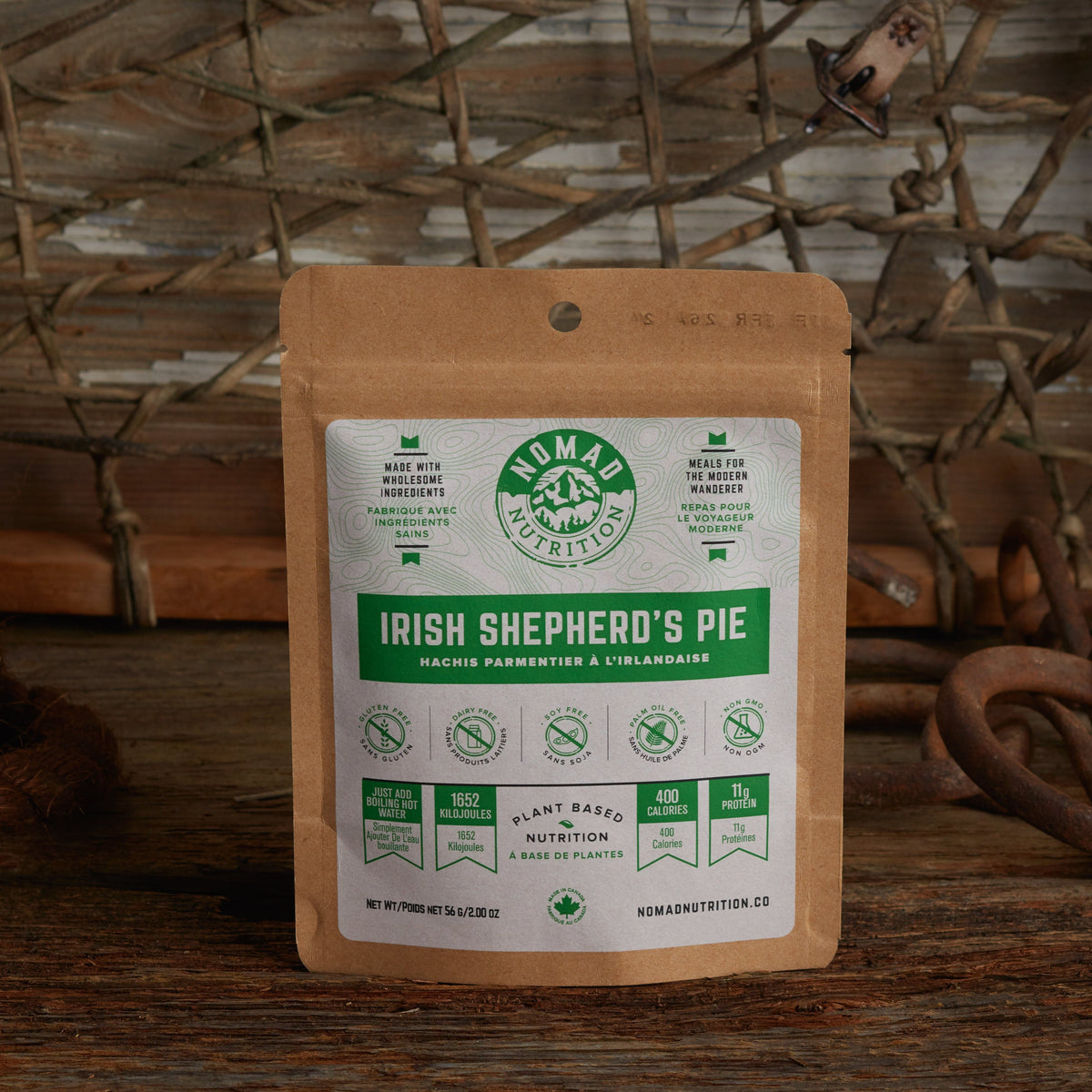 Noma Nutrition Irish Shepherd's Pie package on a wooden surface with a rustic background