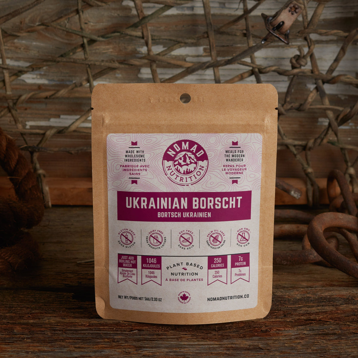 Nomad Nutrition Ukrainian Borscht package on a wooden surface with rustic background