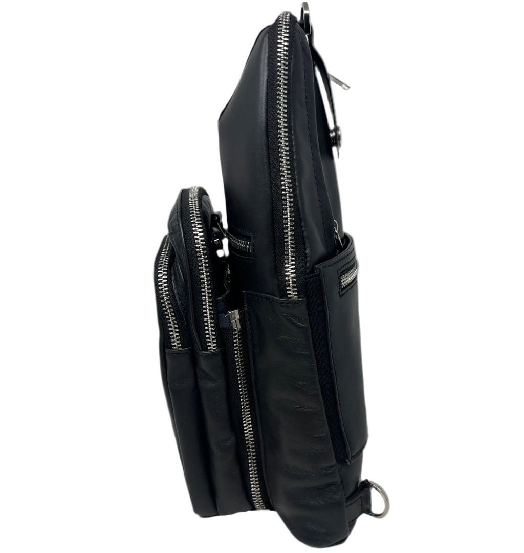 Side profile view of the Gabriel 3-in-1 unisex black crossbody bag, showcasing its multiple zippered compartments, detachable front pouch structure, and silver hardware details against a white background.