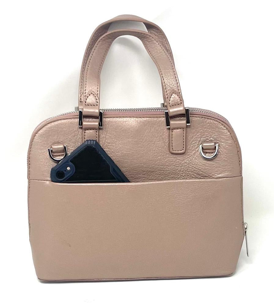 Justine platinum rose leather handbag open view showing interior pockets — Annick Levesque